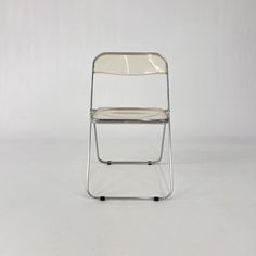 We offer this stunning vintage plastic Plia folding chair. This chair is a well known design and has been in the permanent collection of the Museum of Modern Art in New York.  This chair is in a good vintage condition with signs of use true-out time.  The Dimensions are: Height 75 cm - Width 47 cm - Depth 46 cm. This piece has an attribution mark,   I am sure that it is completely authentic and  take full responsibility for any authenticity   issues arising from misattribution Giancarlo Piretti, The Museum Of Modern Art, Leather Side Chair, Jasper Morrison, Universal Furniture, Vintage Plastic, Museum Of Modern Art, A Well, Folding Chair