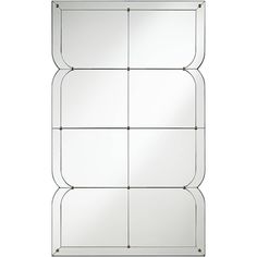 a mirror that is on top of a white wall with four squares in the middle