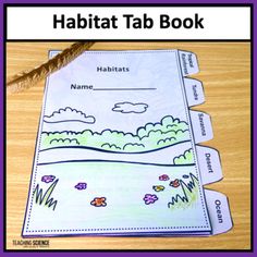 the habitat book for habitats is shown on a wooden table with an animal and fish theme