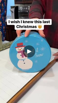 a person holding a snowman plate with the words i wish i knew this last christmas