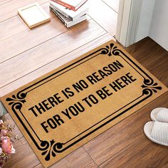 there is no reason for you to be here door mat on the floor next to shoes