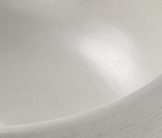 an empty white bowl is shown in this image