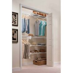 an open closet with clothes and shoes in it