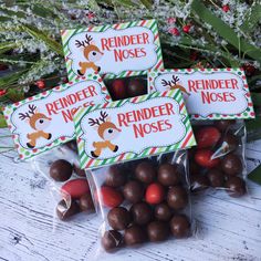 three reindeer nose candy bags filled with chocolate candies