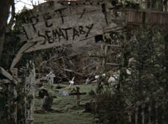 an old cemetery with graffiti written on it