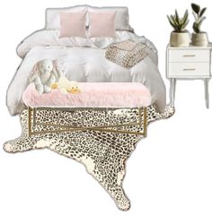 a bedroom with leopard print and pink accents