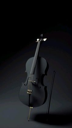 a black violin sitting on top of a table