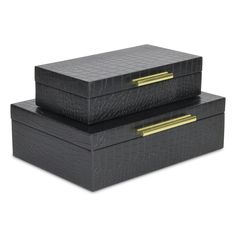 Add a touch of sophistication to your home decor with this black rectangular faux croco decorative box with handles. These boxes feature a modern design with a sleek faux snakeskin pattern overlay and golden handles. They are not only stylish but also functional with their internal storage capabilities. Handmade and crafted from a blend of wood and vinyl materials  these boxes are fully assembled and ready for display  making them the perfect addition to any modern living space.    

Product Features:  
Black rectangular decorative boxes   
Modern design with a sleek faux snakeskin pattern overlay and golden handles  
Handmade and crafted from a blend of wood and vinyl materials  
Fully assembled and ready to use  
Care instructions: wipe clean with a damp cloth and avoid being exposed to Holiday Storage, Patterned Vinyl, Wood Crates, Tidy Up, Black Vinyl, Black Decor, Box Set, Box Design, Contemporary House