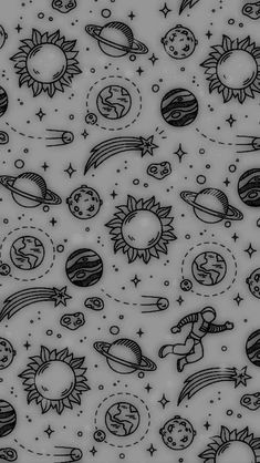 a black and white pattern with sun, planets, stars and other things on it