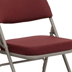 a close up of a red folding chair