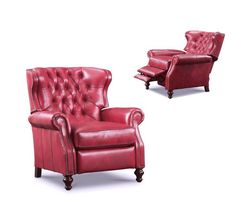 two red leather recliners sitting next to each other on top of a white background