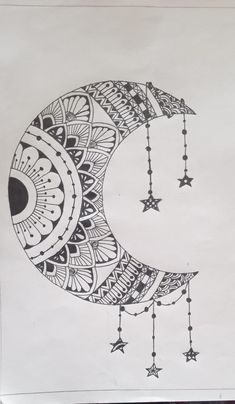 a drawing of a crescent with stars hanging from it