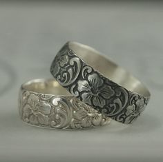 "Silver Wedding Band Wide Floral Ring Aloha Band Hawaiian Ring Polynesian Band Hibiscus Ring Flower Hawaiian Jewelry Polynesian Pattern Band Aloha! We often think of this to mean a simple \"hello\" or \"goodbye,\" but it is so much more. \"Aloha\" directly translates to affection, peace, compassion. It is being one with a larger whole and taking only what you need to survive. This substantial solid .925 sterling silver band features hibiscus flowers and scroll work surrounding the entire band. I Hawaiian Ring, Hawaiian Wedding Rings, Hawaiian Design, Silver Wedding Band, Titanium Wedding Rings, Sterling Silver Wedding Rings, Hawaiian Jewelry, Ring Flower, Custom Wedding Rings