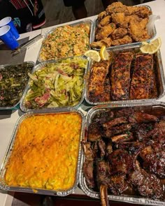 several trays of food on a table