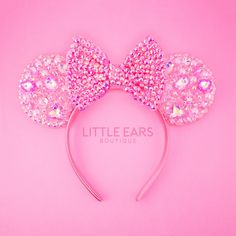 Introducing our Sparkle Mickey Ears – the epitome of elegance and magic! Meticulously handcrafted with passion and precision, each pair is a true work of art. Every stone and embellishment is delicately placed by hand, ensuring the highest quality and attention to detail. Crafted from the finest materials including resin and glass stones, these ears dazzle with a sparkle that turns heads wherever you go.HIGHLIGHTS • Our Sparkle Mickey Ears can fit both adults and kids aged seven and above comfortably. • Each stone is carefully placed by hand by one of our artisians. • A bit heavier than our normal ears but comfortable enough to be worn all day without causing headaches or discomfort. • Constructed with top-notch materials including glass and resin rhinestones, satin or PVC Bow and acrylic Pvc Bow, Mini Mouse Ears, Disney Poses, Disneyland Christmas, Disney Mickey Ears, Christmas Cups, Halloween Cups, Mouse Ears Headband, Ears Headband