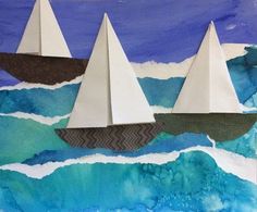 three paper boats floating on top of the ocean