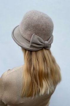 Handmade Ships from a small business in Florida Materials: wool Description ❄️ Cute wool cloche hat with a bow in a variety of colors to choose from! Colors: beige, camel, gray, black ❄️ This hat is foldable hat and it is easy to store and carry. ❄️ Adjustable size to fit 21-23 inch (53-58cm) head circumference. ❄️ Carefully hand-knitted for you from soft 100% wool that will keep you warm and comfortable in winter! ❄️ Makes an ideal gift for her! Beige Brimmed Felt Hat For Winter, Beige Winter Fedora Hat, Beige Fedora Winter Hat, Beige Felt Hat With Short Brim For Winter, Beige Short Brim Felt Hat For Winter, Chic Beanie For Winter, Chic Beanie Hat For Winter, Classic Winter Cloche Felt Hat, Classic Cloche Felt Hat For Winter