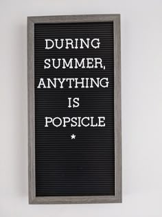 a sign that says during summer, anything is popsicle on the side of a wall