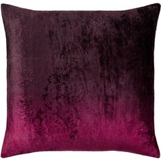 a purple velvet pillow on a white background