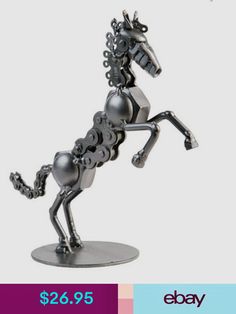 a metal figurine of a horse is on display