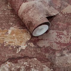 a rolled up rug on top of a floor