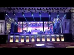 the stage is set up for an event with lights and sound effects on it,