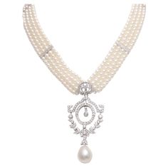 Magnificent, Eye Catching 18 kt. White Gold Pearl Necklace With Large South Sea Pearl, Diamonds Pearls: 4 rows of fresh water pearls approx. 4 mm each, together 344 pearls 1 Large Australian south sea pearl approx. 14.35 mm x 12.1 mm Diamonds: Brilliant cut diamond 1.87 ct. Material: 18 kt. white gold Measurements: 43 cm long ,can be worn bigger or smaller as it has chain on lock ! Total weight: 46.8 gram / 1.650 oz / 30.1 dwt Luxury White Pearl Round Pendant Necklace, Luxury Diamond Pearl Necklace With Pendant, Luxury 8mm Beads Pearl Necklace, Luxury Single Strand White Pearl Necklace, Gold Pearl Jewelry Necklace 1stdibs, Antique Pearl Necklace, Gold Pearl Necklace, Fresh Water Pearls, Sea Pearl