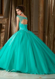 Morilee Vizcaya Quinceanera Dress 89108 JEWELED BEADED SATIN BODICE ON A TULLE BALL GOWN Matching Stole. Available in Mint Leaf, Coral, Champagne, White (Color of this dress): Mint Leaf Turquoise Quinceanera Dresses, Mori Lee Quinceanera Dresses, Quinceñera Dresses, Pretty Quinceanera Dresses, Quince Dress, Dresses Quinceanera, Tulle Ball Gown, Sweet 16 Dresses, Dressy Dresses