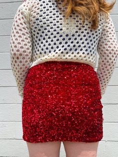 THE DREAM PARTY SKIRT IS HERE!!!! This Red Sequin Skirt will have heads turning at how cute your outfit is! Style with a sweater and tights for a holiday outing or your favorite bodysuit for a party look! This sparkly red looks amazing with greens, pinks, blues, whites, and blacks! The cutest and sparkliest skirt Style with sweaters, cute tops, and tights Pairs well with blue, green, pink, white, and black True to size. 95% Polyester 5% Spandex Kalianna is 5'7 wearing a size small and typically Winter Party Mini Skirt With Lining, Winter Mini Skirt With Sequins, Winter Party Mini Skirt With Stretch, Winter Sequined Mini Skirt, Stretch Mini Skirt For Winter Party, Red Lined Skirt For Winter, Fitted Winter Skort For Night Out, Fitted Skort For Winter Night Out, Fitted Holiday Bottoms For Fall