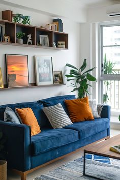 a living room filled with lots of furniture and decor on top of a hard wood floor