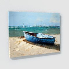 a painting of a blue boat on the beach with sailboats in the water behind it