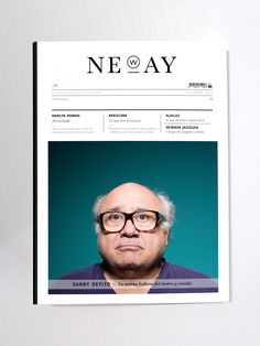 a magazine with a man wearing glasses on it's front page and the title ne oay written in chinese