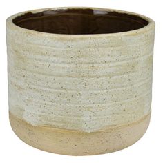 a close up of a ceramic pot on a white background with no people around it