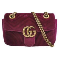 Gucci Marmont Mini Flap Pink Velvet Handbag These are professional photos of the actual bag offered by Luxbags. The Gucci Marmont Mini Flap Pink Velvet Crossbody Bag is a timeless and adaptable accessory designed by the renowned brand Gucci. Its signature V-shaped chevron stitching and prominent GG logo hardware on the flap opening make it instantly recognizable. The gold-tone chain and leather strap add a touch of luxury and convenience. From day to night, this handbag will serve as a staple in your wardrobe. CONDITION: GOOD This preloved authentic handbag is in good condition with moderate signs of wear. Rubbing on the corners and edges. Light tarnishing of the hardware. DETAILS Gucci Marmont Material: Velvet Color: Pink Size: Mini Width 21.5cm x Height 14cm x Depth 6cm Weight 530g Gucci Marmont Mini, Velvet Handbag, Chevron Stitch, Gucci Purse, Gucci Marmont, Professional Photos, Gg Logo, Velvet Color, Pink Velvet