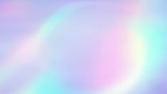 an abstract blurry background with rainbow colors