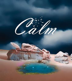 a poster with the words calm in front of some rocks and a body of water