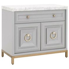 a white and gold cabinet with two doors