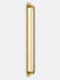 a brass door handle on a white background