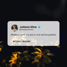 the tweet is posted to someone on their phone, with yellow flowers in front of them