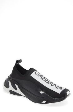 Dolce&Gabbana offer a logomania take on the athletic-shoe trend with this slip-on sneaker made from technical stretch mesh with a lightweight molded sole. Slip-on style Removable insole Textile upper and lining/synthetic sole Made in Italy Men's Designer Shoes Modern Slip-on Sneakers With Boost Midsole, Sporty Black Running Shoes With Logo, Athleisure Slip-on Sneakers With Abzorb Midsole, Nylon Sneakers With Logo For Streetwear, Sports Sneakers With Logo, Athleisure Slip-on Sneakers With Boost Midsole, Black Sporty Running Shoes With Logo, Branded Insole Slip-on Sneakers For Athleisure, Slip-on Sneakers For Streetwear Athleisure