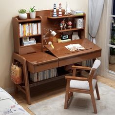 a wooden desk and chair in a room with a white rug on the floor next to a window