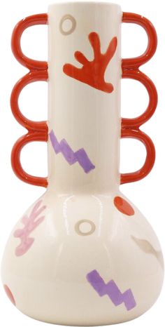 a white vase with red and purple designs on it's sides, sitting in front of a white background