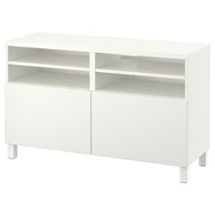 a white entertainment center with two open shelves on one side and three doors on the other