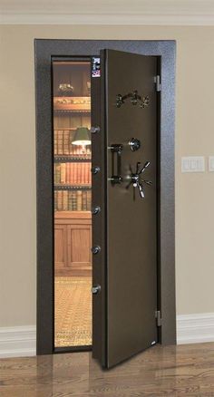 an open safe door in the middle of a room