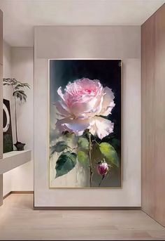 a large pink rose in a white vase on a wall next to a shelf and mirror