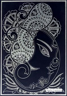 an intricately designed black and white painting with paisley designs on the border, depicting a woman's face