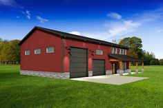 a large red barn with two garages on each side