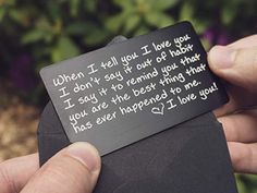 a person holding a piece of paper with writing on it that says, when i tell you love you, i don't say if