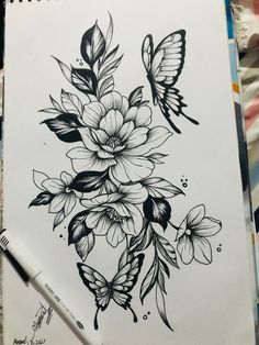 a drawing of flowers and butterflies on paper