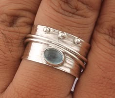 925 Sterling Silver Natural Aquamarine Spinner Ring. Available in different size. Gemstone Name: Natural Aquamarine Metal: 925 Sterling Silver Ring Size: Optional Quantity: 1 Piece Silver Rings Handmade Artisan Jewelry, Silver Aquamarine Ring, 18th Present Ideas, Handmade Silver Rings, Hammered Silver Jewelry, Unique Silver Rings, Silver Smithing, Silver Ring Designs, Silver Rings With Stones